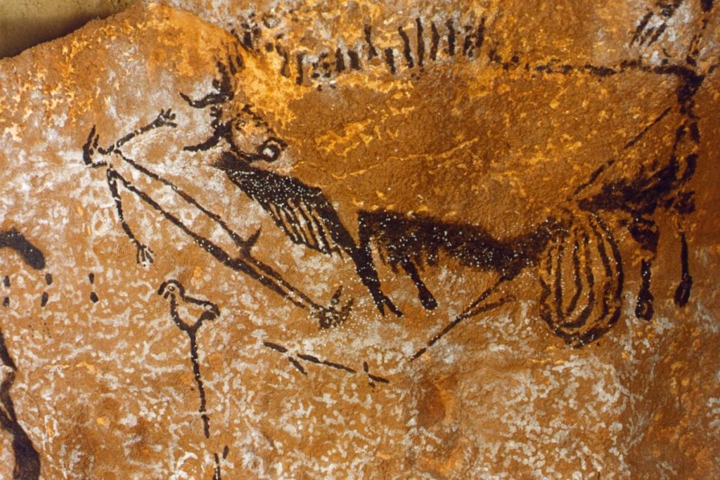 Une peinture représentant un homme montant à cheval sur un mur.