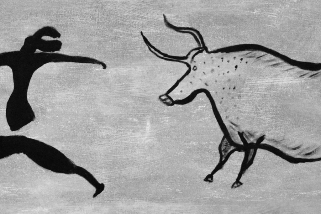Un dessin en noir et blanc d'un homme et d'un taureau.